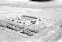 Aerial photograph of a farm in Saskatchewan (35-43-23-W3)