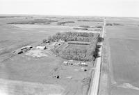 Aerial photograph of a farm in Saskatchewan (22-43-23-W3)