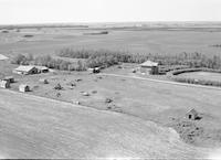 Aerial photograph of a farm in Saskatchewan (10-43-23-W3)