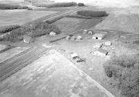 Aerial photograph of a farm in Saskatchewan (27-46-14-W3)