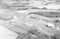 Aerial photograph of a farm in Saskatchewan (30-46-14-W3)