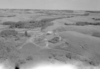 Aerial photograph of a farm in Saskatchewan (10-46-14-W3)