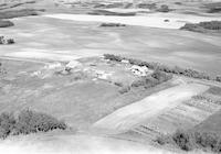 Aerial photograph of a farm in Saskatchewan (47-18-W3)