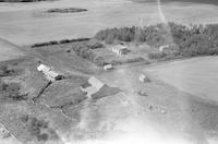 Aerial photograph of a farm in Saskatchewan (47-18-W3)