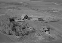 Aerial photograph of a farm in Saskatchewan (27-48-23-W3)