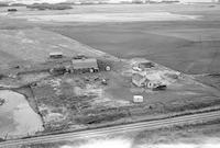 Aerial photograph of a farm in Saskatchewan (6-48-23-W3)