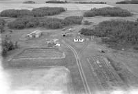 Aerial photograph of a farm in Saskatchewan (6-48-23-W3)