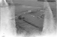 Aerial photograph of a farm in Saskatchewan (7-48-23-W3)