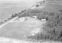 Aerial photograph of a farm in Saskatchewan (1-42-12-W3)