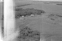 Aerial photograph of a farm in Saskatchewan (34-42-12-W3)