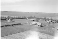 Aerial photograph of a farm in Saskatchewan (42-12-W3)