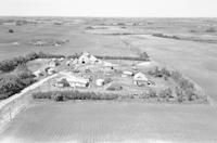 Aerial photograph of a farm in Saskatchewan (30-42-12-W3)