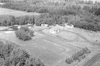 Aerial photograph of a farm near Meadow Lake, SK