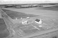 Aerial photograph of a farm near Meadow Lake, SK