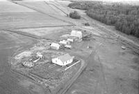 Aerial photograph of a farm near Meadow Lake, SK