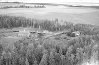 Aerial photograph of a farm near Meadow Lake, SK