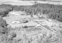 Aerial photograph of a farm near Meadow Lake, SK