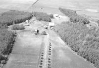 Aerial photograph of a farm near Meadow Lake, SK