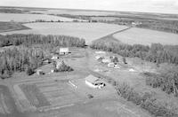 Aerial photograph of a farm near Meadow Lake, SK