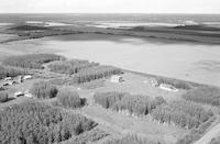 Aerial photograph of a farm near Meadow Lake, SK