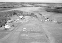 Aerial photograph of a farm near Meadow Lake, SK