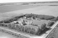 Aerial photograph of a farm near Meadow Lake, SK