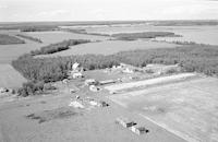 Aerial photograph of a farm near Meadow Lake, SK