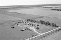 Aerial photograph of a farm near Meadow Lake, SK