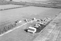 Aerial photograph of a farm near Meadow Lake, SK