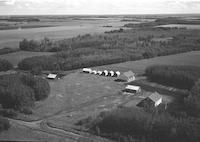 Aerial photograph of a farm near Meadow Lake, SK