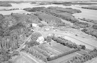 Aerial photograph of a farm near Meadow Lake, SK