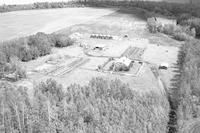 Aerial photograph of a farm near Meadow Lake, SK