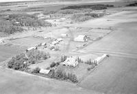 Aerial photograph of a farm near Meadow Lake, SK