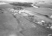 Aerial photograph of a farm near Meadow Lake, SK