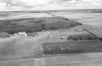 Aerial photograph of a farm near Meadow Lake, SK