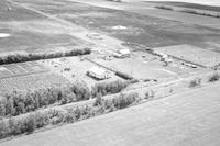 Aerial photograph of a farm near Meadow Lake, SK