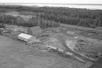 Aerial photograph of a farm near Meadow Lake, SK