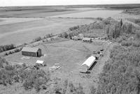 Aerial photograph of a farm near Meadow Lake, SK