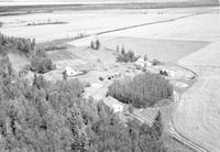 Aerial photograph of a farm near Meadow Lake, SK