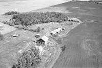 Aerial photograph of a farm near Meadow Lake, SK