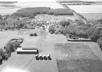 Aerial photograph of a farm near Meadow Lake, SK