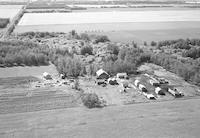 Aerial photograph of a farm near Meadow Lake, SK