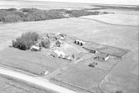 Aerial photograph of a farm near Meadow Lake, SK