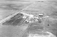 Aerial photograph of a farm in Saskatchewan (37-21-W3)