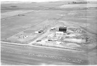 Aerial photograph of a farm in Saskatchewan (38-21-W3)