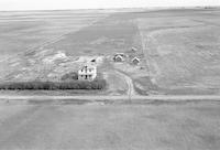 Aerial photograph of a farm in Saskatchewan (5-38-21-W3)