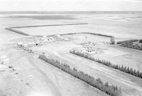 Aerial photograph of a farm in Saskatchewan (38-21-W3)