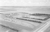 Aerial photograph of a farm in Saskatchewan (38-21-W3)