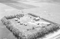 Aerial photograph of a farm in Saskatchewan (38-21-W3)