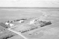Aerial photograph of a farm in Saskatchewan (10-38-21-W3)